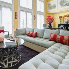 Green Tufted Sectional in Yellow Living Room