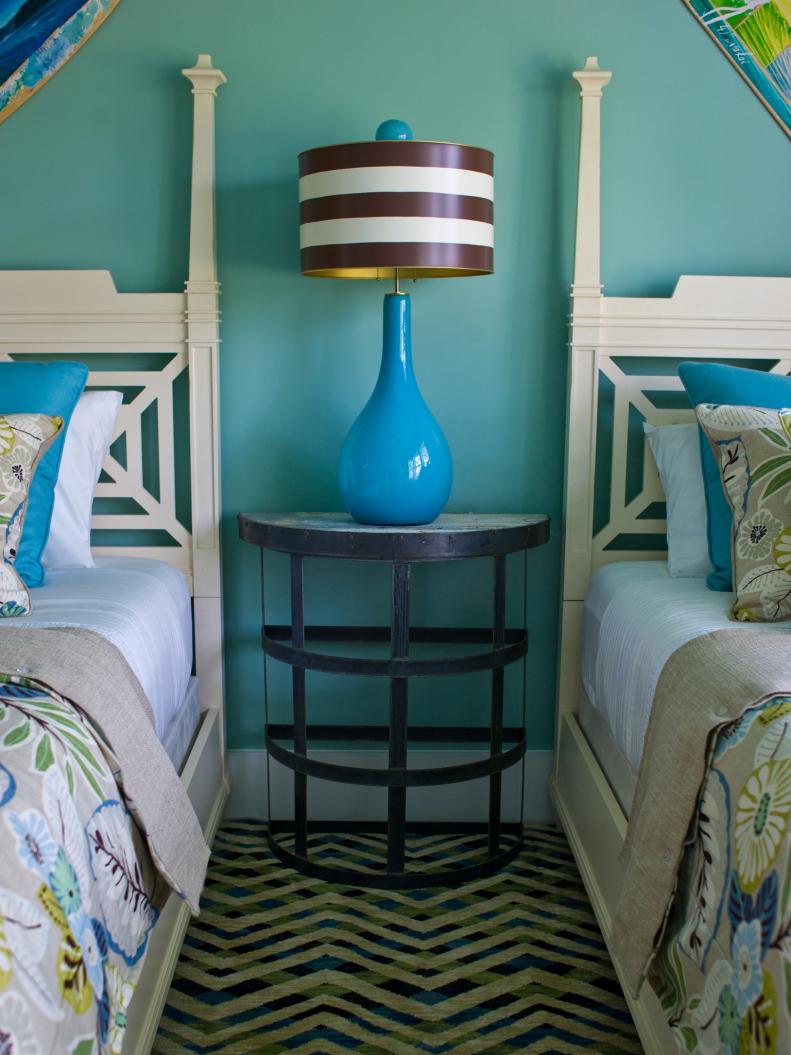 Blue Bedroom With White Twin Beds, Metal Nightstand and Turquoise Lamp