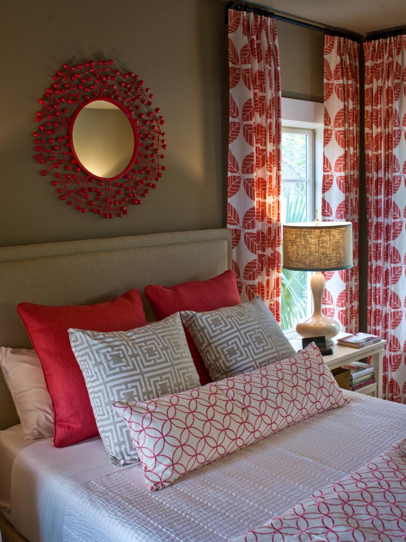 Brown Room With Red and White Curtains, Pillows and Starburst Mirror