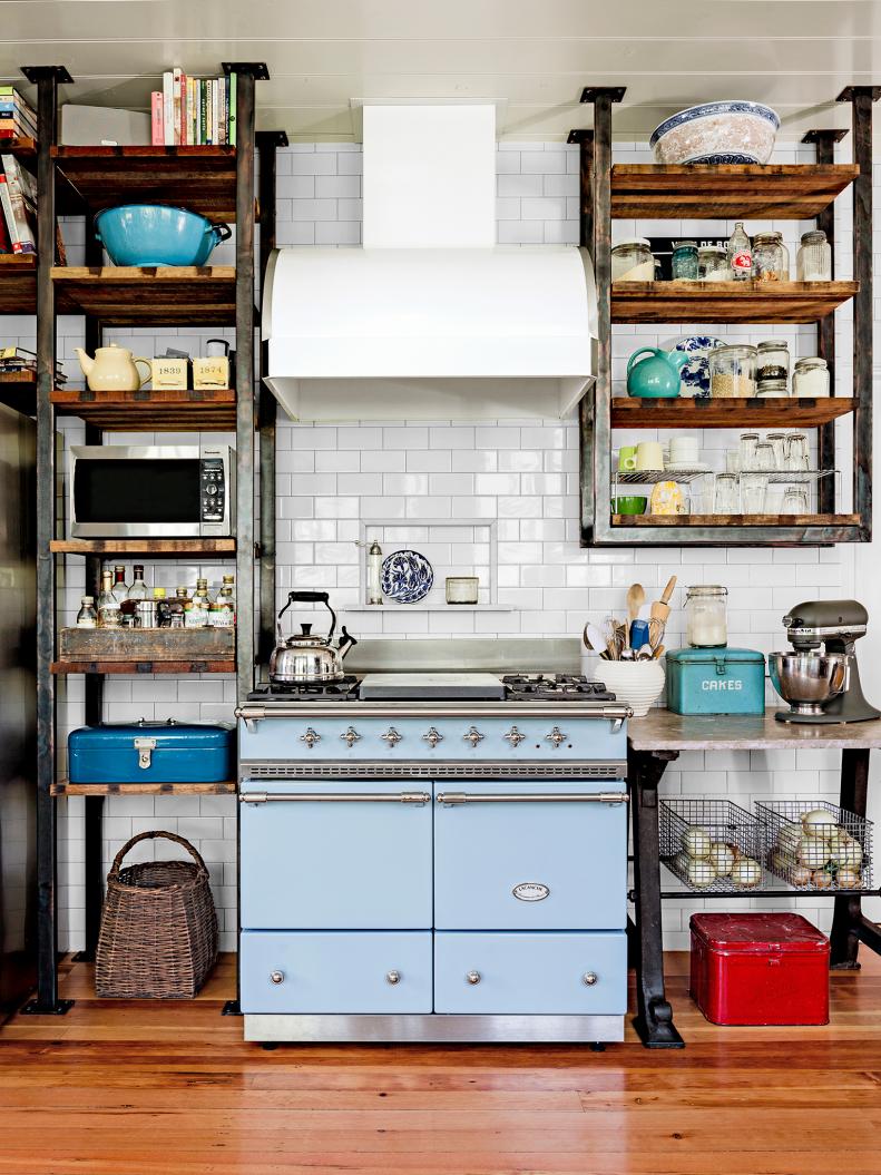 Open Wood Shelves in Kitchen With Blue Vintage Stove