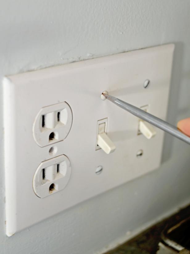 Use a screwdriver to remove all switch plates.