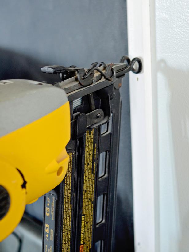 In some kitchens, it may be necessary to install pieces of trim to provide a clean edge where the chalkboard paint ends. Cut trim to size with a hand saw or chop saw (miter saw). Fit trim into place to ensure a proper fit then secure to wall with a finish nailer or hammer and finish nails.