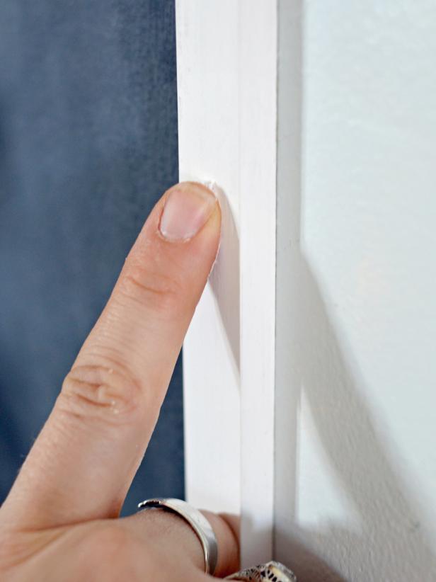 After fitting trim into place to ensure a proper fit and securing to wall, use caulk to fill seams and nail holes.