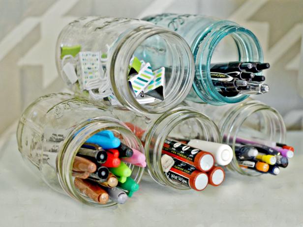 Stacked Mason Jars Holding Office Supplies