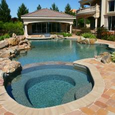 Outdoor Pool With Hot Tub and Pool House 