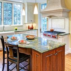 Traditional Kitchen With Green Marble-Topped Island