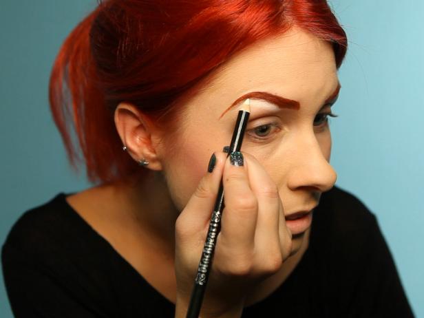 Use a white eyeliner pencil to define under brow bone then smudge.