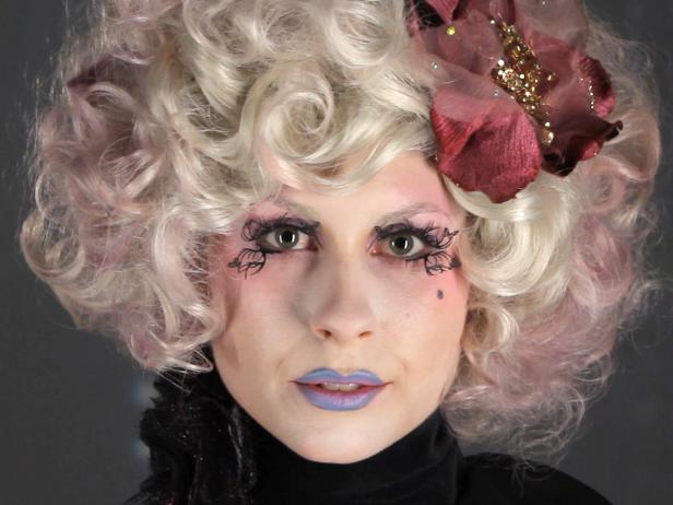 Woman Dressed as Effie Trinket for Halloween Costume