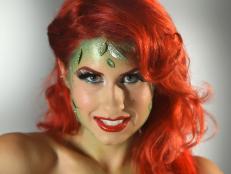 Woman With Red Wig, Green Ivy and Red Lips for Halloween Costume