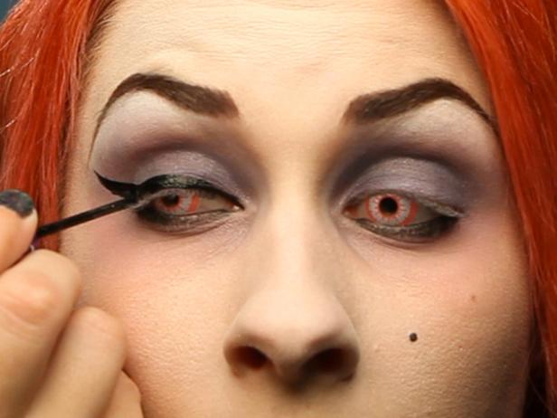 Want to look extra saucy and spooktacular as a Glam Dark Fairy this Halloween? Create a thick, dramatic cat eye using black liquid eyeliner on your top eyelid.