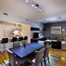 Gray Open Dining and Living Room With Breakfast Bar