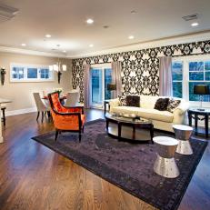 Contemporary Living and Dining Area With Black-and-White Patterned Wallpaper