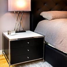 Gray Bedroom With White-Topped Nightstand