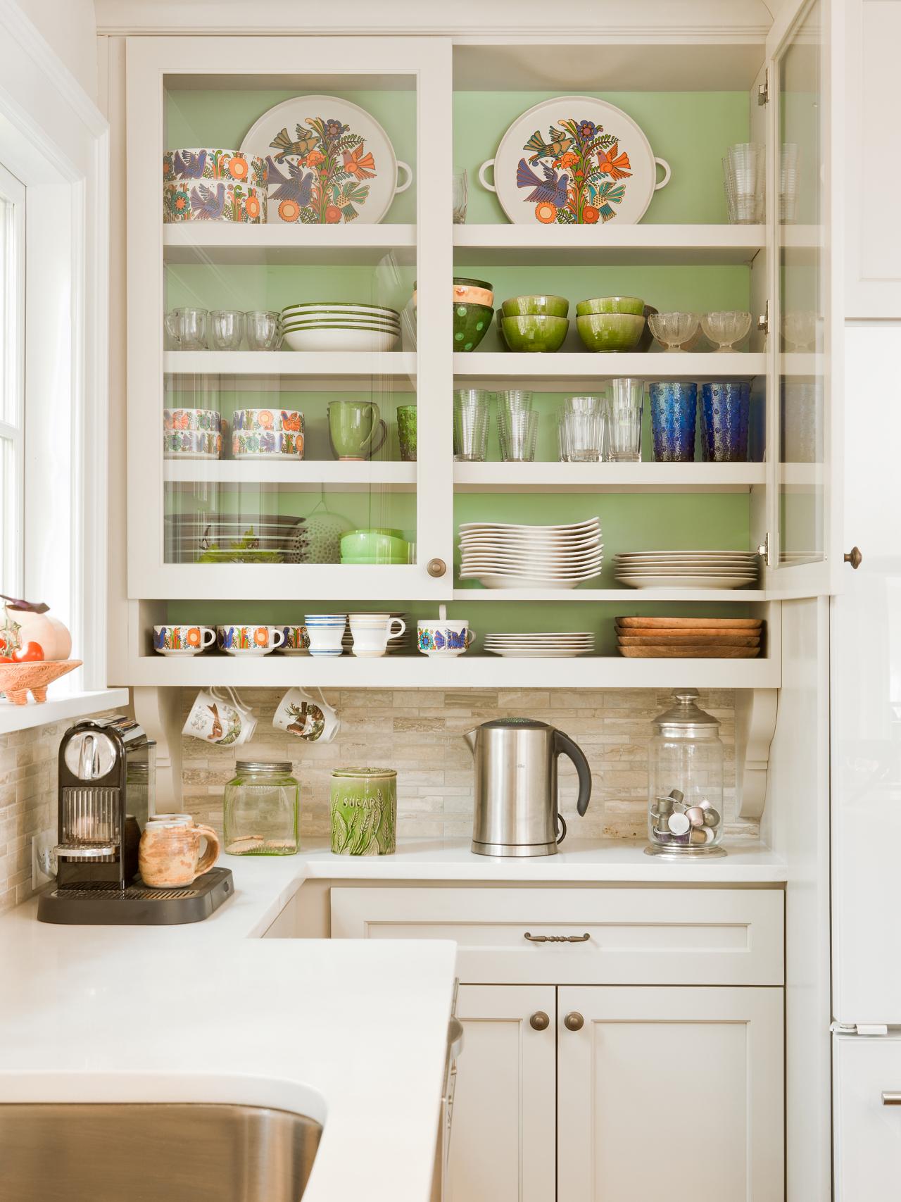White Kitchen Cabinets With Green Interior And Glass Doors Hgtv