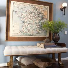 White Bench Seating and Large Framed Map