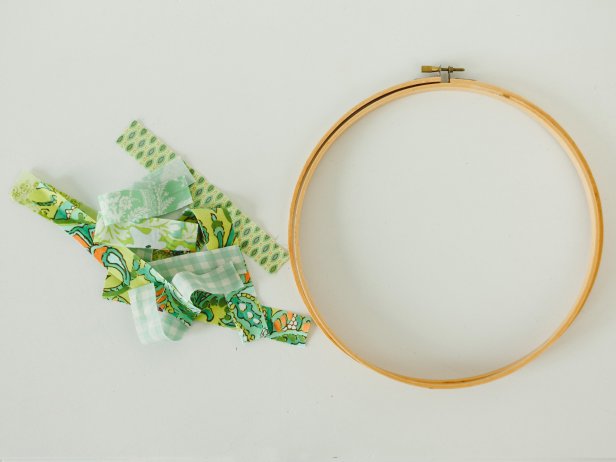 Embroidery Hoop and Strips of Green Fabric