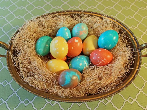 Marbleized Easter eggs in a brass urn as a centerpiece