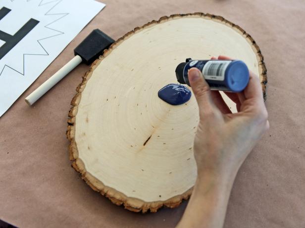 Use foam paintbrush to apply a thin coat of acrylic paint to wood plaque
