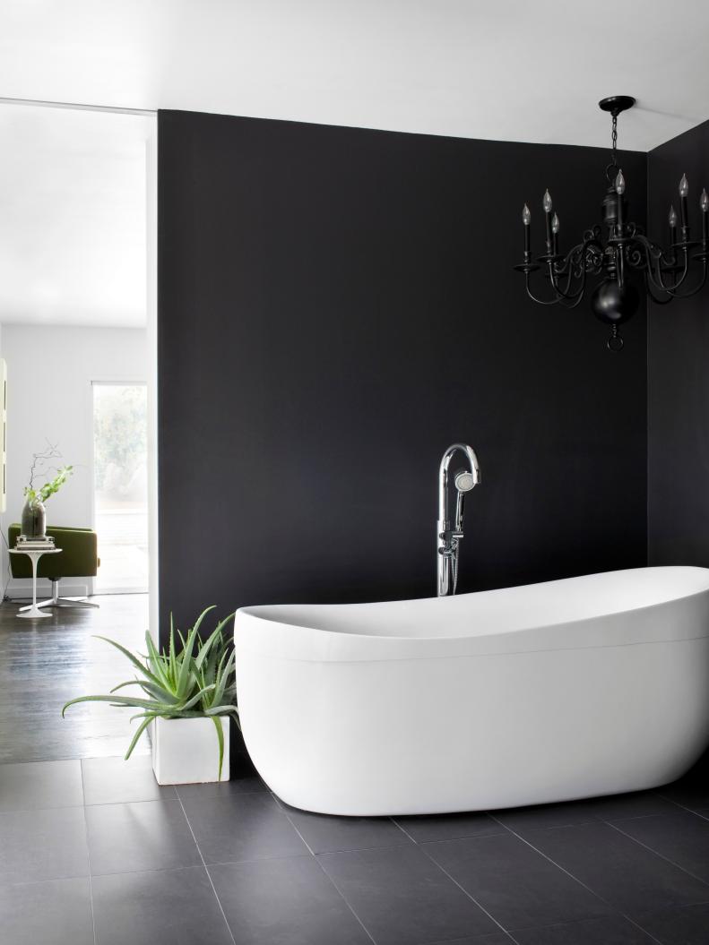 Black Wall And Chandelier In Modern Bathroom
