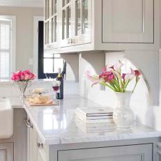 Neutral Kitchen With Marble Countertop