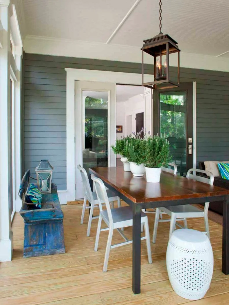 Transitional Outdoor Dining Area With Antique Blue Bench