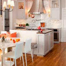 White Kitchen With Banquette Dining Area