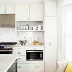Sparkling White Kitchen With Dark Hardwood Floors