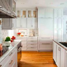 Modern White Kitchen with Marble Countertops & Backsplash