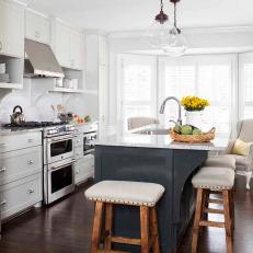 White Transitional Kitchen With Gray Island
