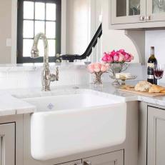 Neutral Kitchen With White Farmhouse Sink