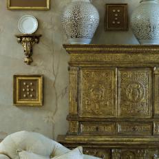 Gilded Cabinet With Ornate White and Gold Urns