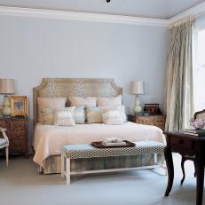 Soft Blue and Cream Bedroom With Antique Writing Table