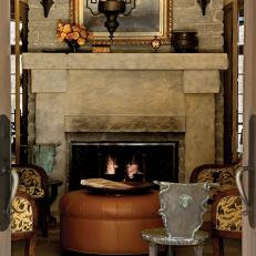 Mediterranean Inspired Foyer With Stone Fireplace