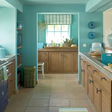 Tropical Style Kitchen With Blue Walls