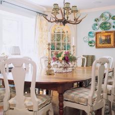 Cottage Dining Room With Antler Chandelier 