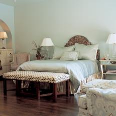 Blue Bedroom With a Mix of Delicate Patterns