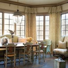 Neutral Breakfast Room With Large Windows