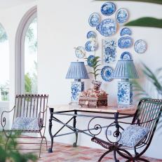 Sitting Area With Antique Dishware Art
