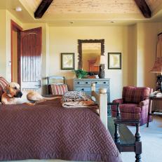 Country-Style Bedroom With Pyramid-Style Vaulted Ceiling
