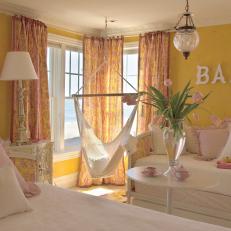 Yellow and Pink Bedroom With Two Daybeds