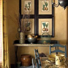 Neutral Dining Area With Rustic Accents and Botanical Drawings