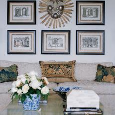 Sitting Area With Neutral Sofa and Black-Framed Art