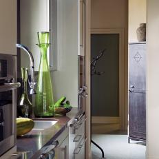 Contemporary Galley Kitchen With Green Vase