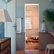 Tropical Dressing Room and Bath With Terra Cotta Tile