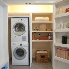 Small White Laundry Closet With Storage