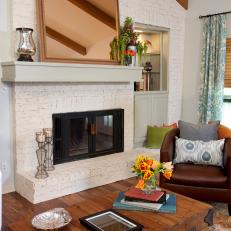 Cozy Living Room With White Brick Fireplace