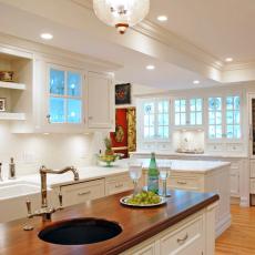 Traditional White Kitchen With Cherry Wood Island