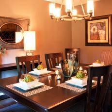 Transitional Brown Dining Room With Sleek Dining Table