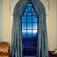 White and Blue Arched Window With Columns