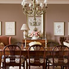 A Sophisticated Dining Room With a Traditional Chandelier